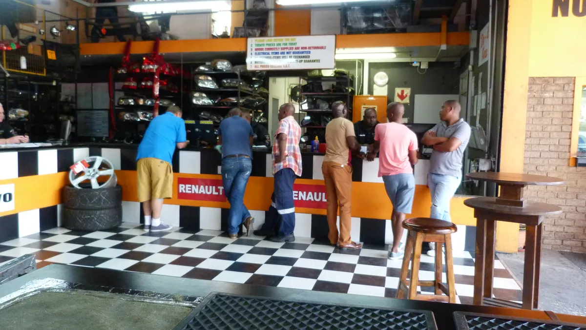 Customers being served at the Sparesboyz parts counter in Briardene, Durban North