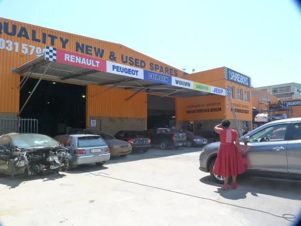 Vehicles being stripped for spares outside the Sparesboyz premises